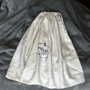 Prada White Drawstring Bag with Blue Logo